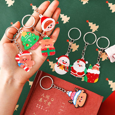 Feestelijke kerst sneeuwman sleutelhanger met transparante acryl en metaal bevestiging